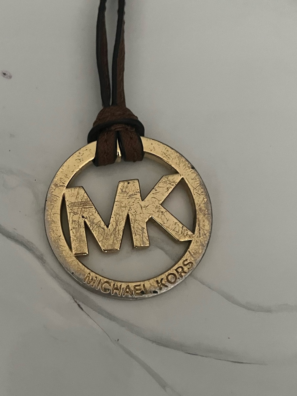 Michael Kors Men's Gold MK Logo Leather Cord bag tag